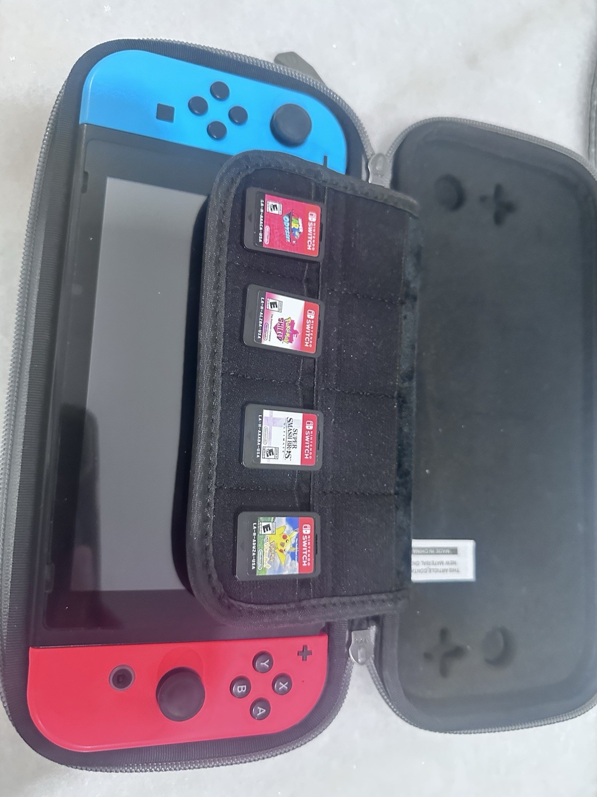 Nintendo Switch Console Bundle w/ Neon Red/Blue Joy-Con, Games, Dock and Cables