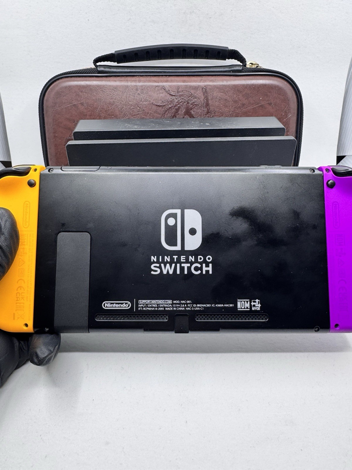 Nintendo Switch 32GB Console with Orange and Purple Joy-Con [w/ Dock & Case]