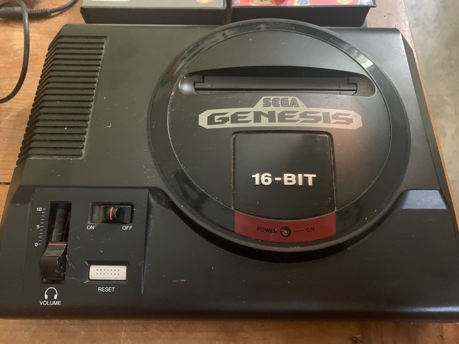 Sega Genesis 16-bit Model 1601 with one controller, power cords and 3 games