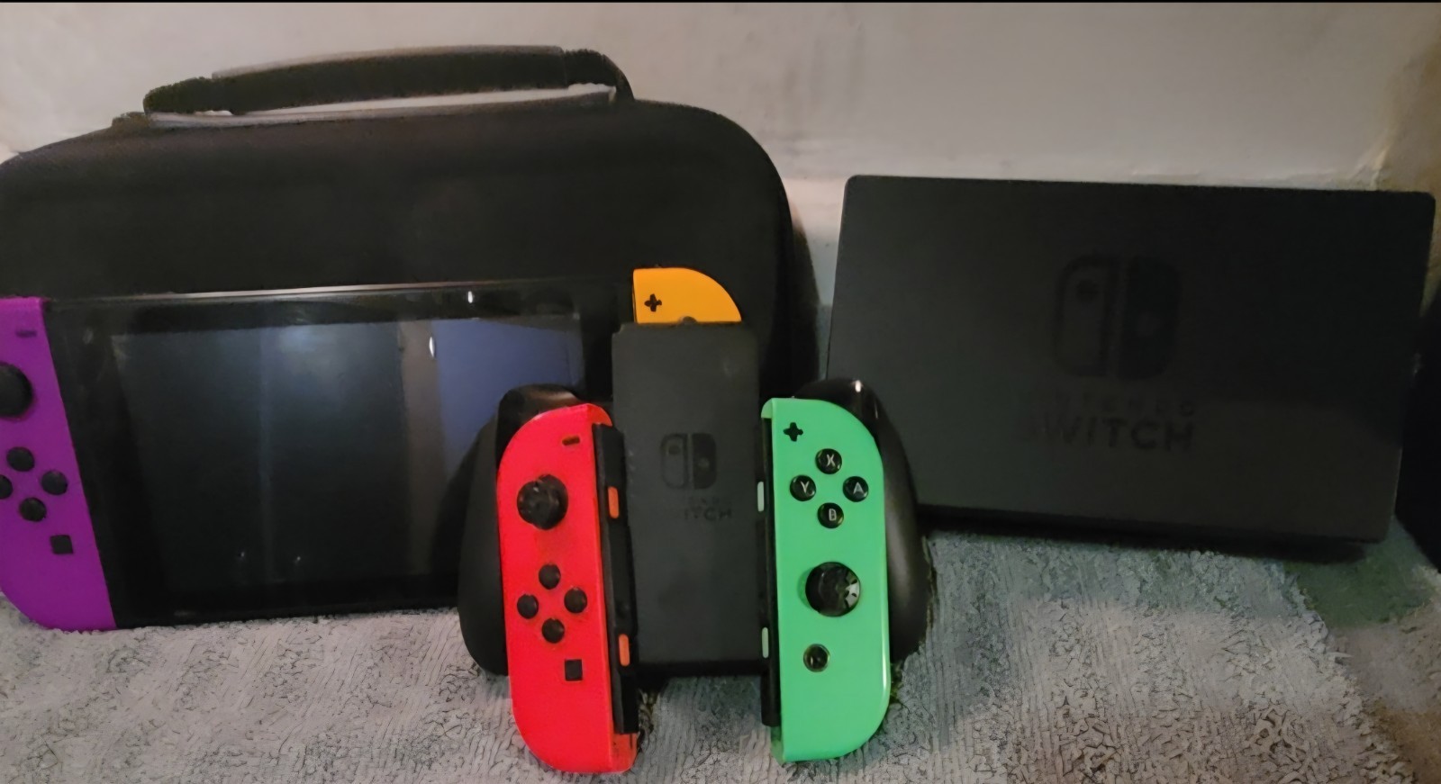 Nintendo Switch plus dock, joycons, steering wheel, game accessories, etc lot