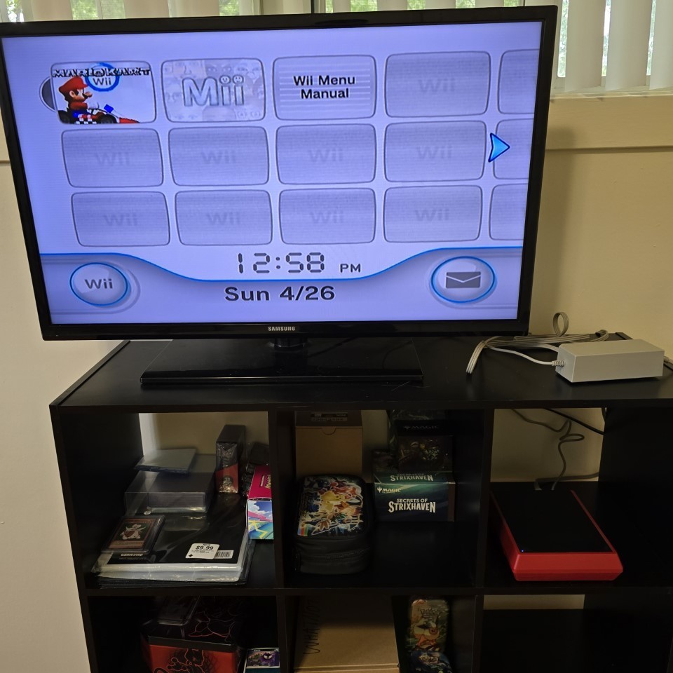 Nintendo Wii MINI Red RVL-201 Console with cables, controller, and Mario Kart