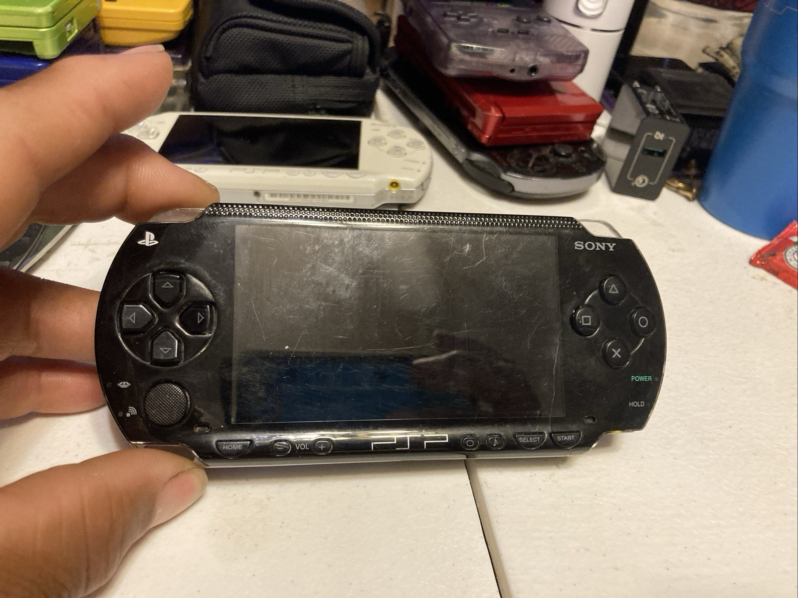 Sony PSP Go PSP-1001 PlayStation Portable – Black has Small Crack In Screen