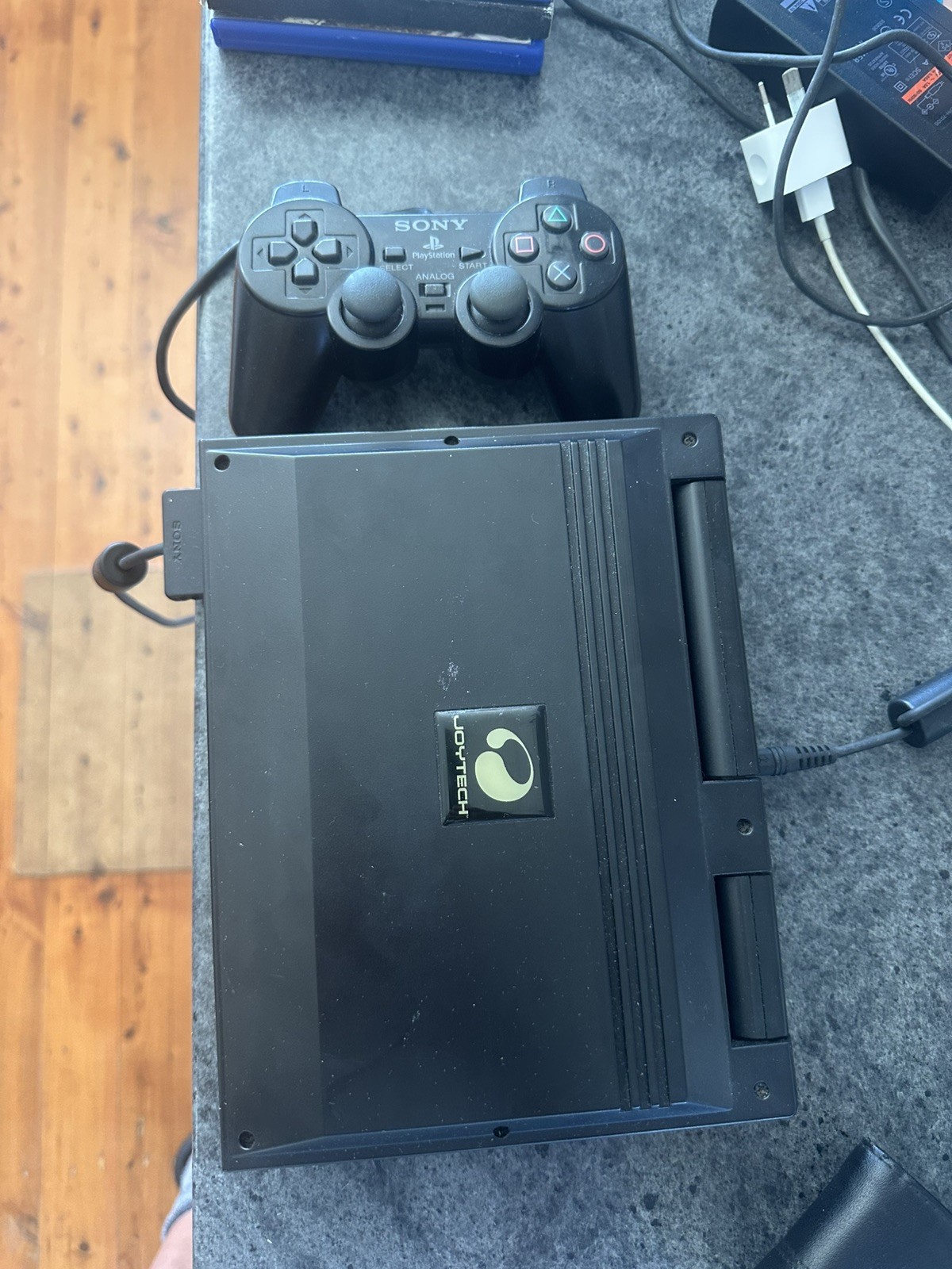 PlayStation 2 Slim Console black with joyteck 8inch screen and nfs most wanted
