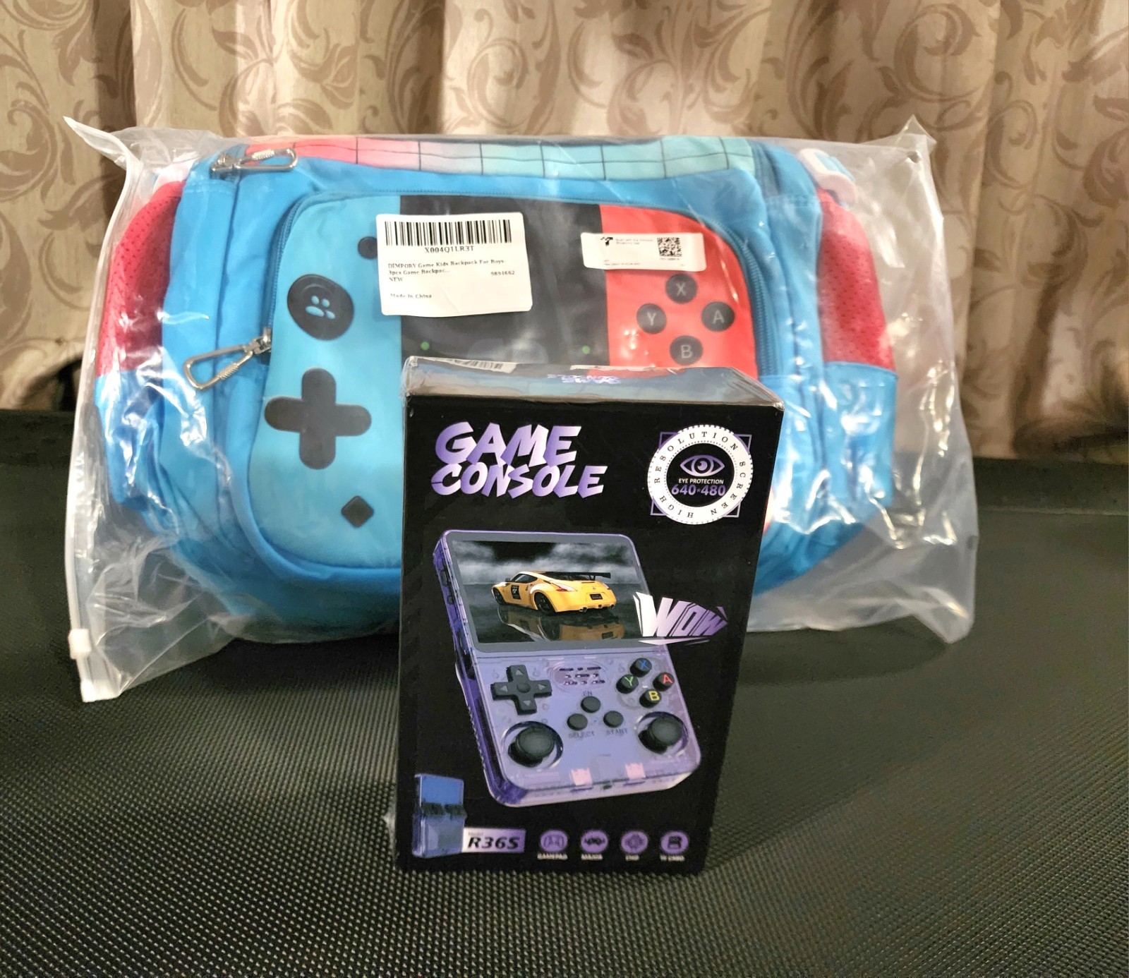 R36S Retro Handheld Video Game Console with a 3Pcs Game School Backpack. BUNDLE