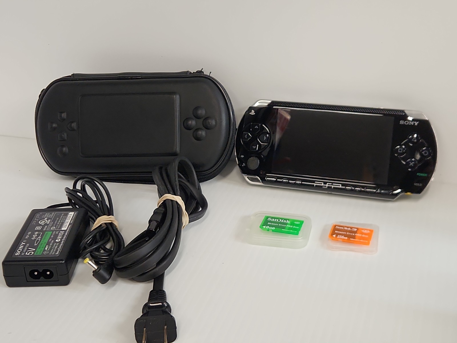 Sony PSP Handheld Video Game System Tested W/charger / No BATTERY. Excellent CON