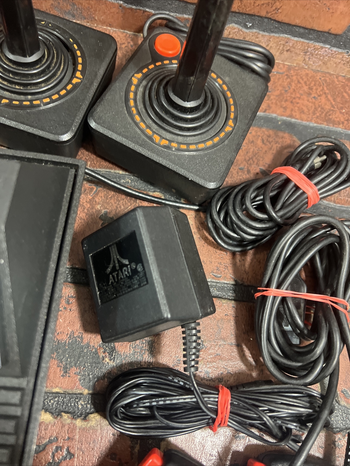 ATARI 2600 4-Switch w/ Power Supply, Joysticks, Paddles, TV Adapter & 7 Games