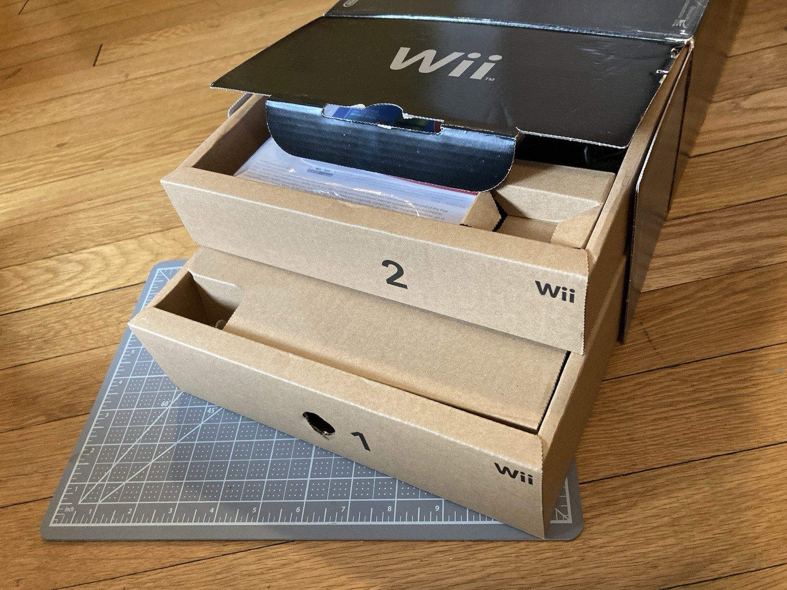 NEW Black Nintendo Wii Open box, includes Super Mario Bros. Wii