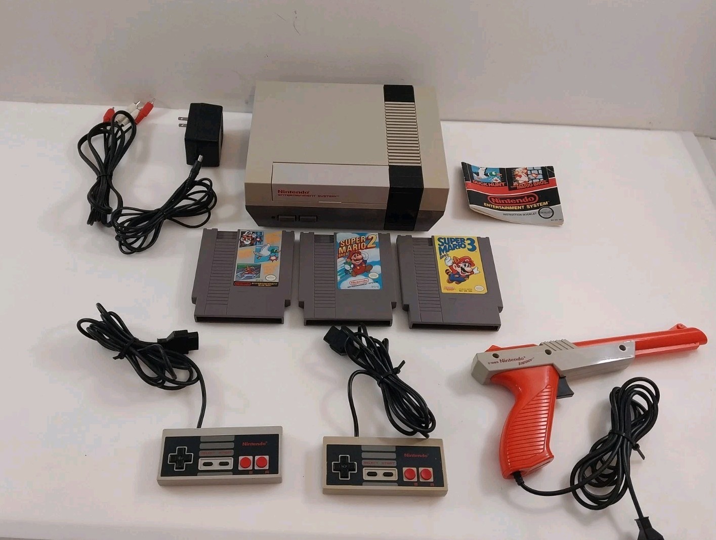 Nintendo NES Console Bundle W Super Mario Bros 1 2 & 3 Zapper Gun 2 Controllers