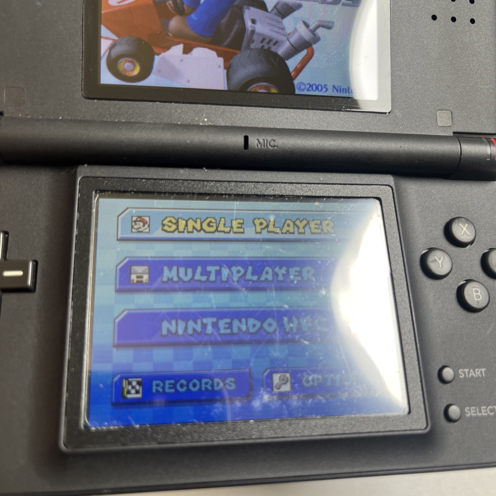 Nintendo DS Lite in Maroon with DS Lite With 5 Games