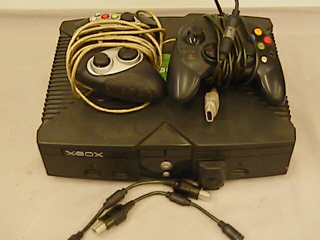Original Microsoft Xbox with 2 controllers not working for parts or repair