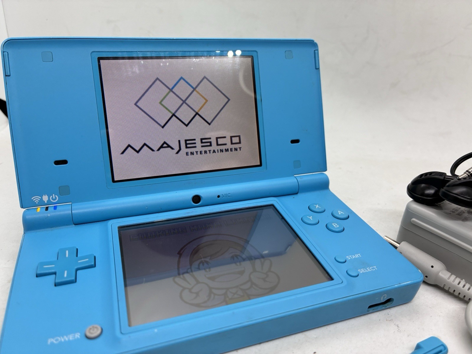 Nintendo DSi Blue Handheld Console (READ). Tested With Stylus, Earbuds Charger