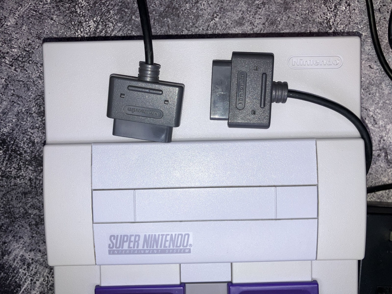 Nintendo SNES Console – Includes 2 controllers, RCA Cable, Power cable and Game.