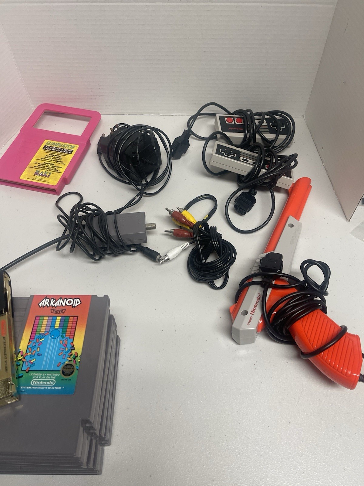 Original Nintendo NES bundle with cords, 2 controllers, zapper, and 17 games