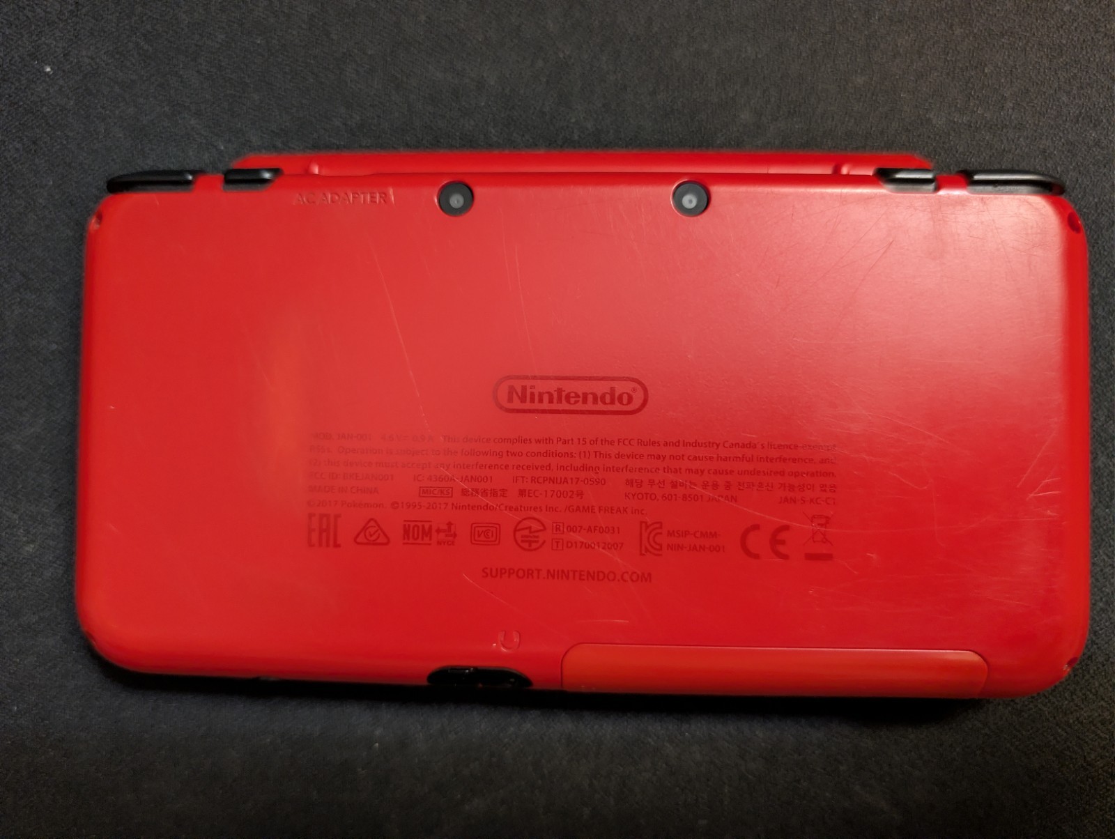 (Region Unlocked) Monster Ball New 2DS LL + 128GB MicroSD Card & 7 Games