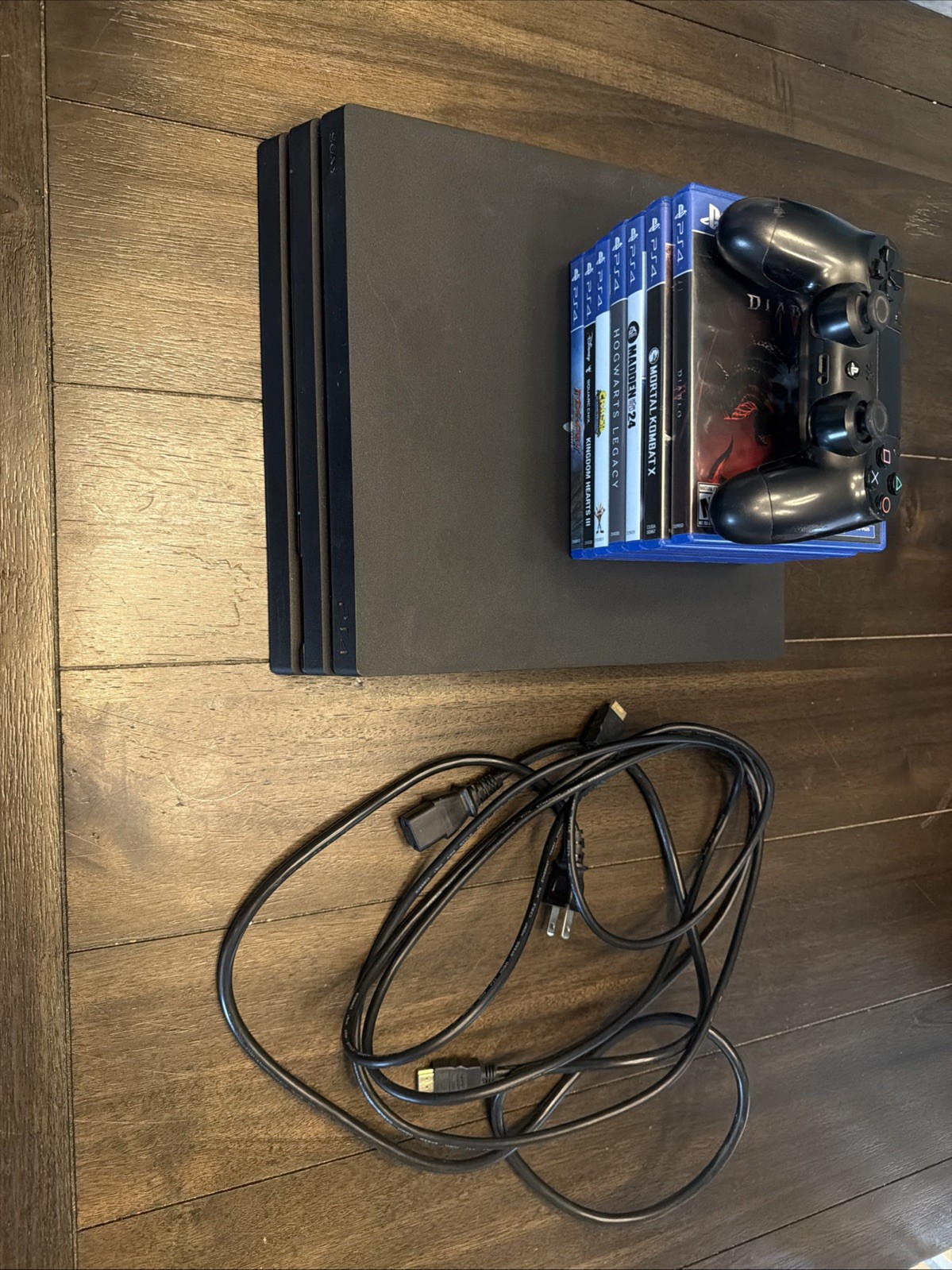 Sony PlayStation 4 Pro 1TB Console – Black w/ Cables, 1 Controller, Games