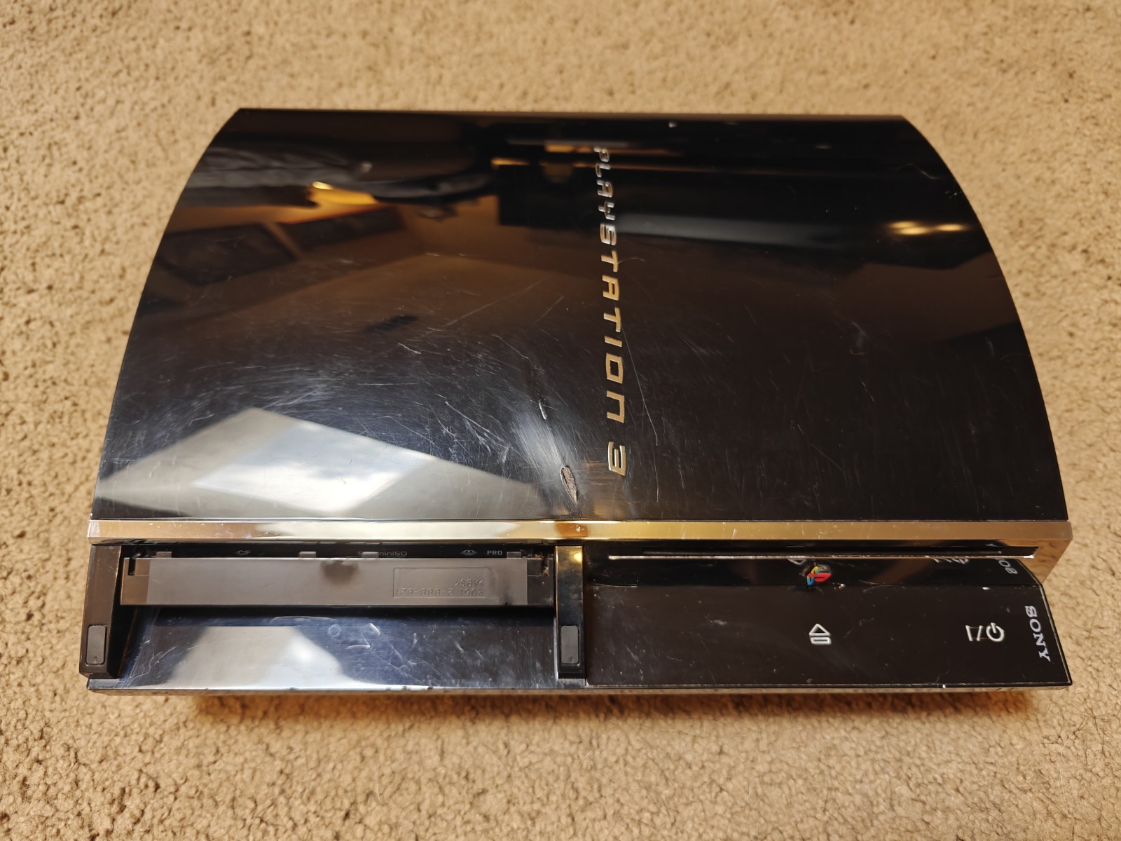 Sony PlayStation 3 CECHA01 60GB Piano Console – Black