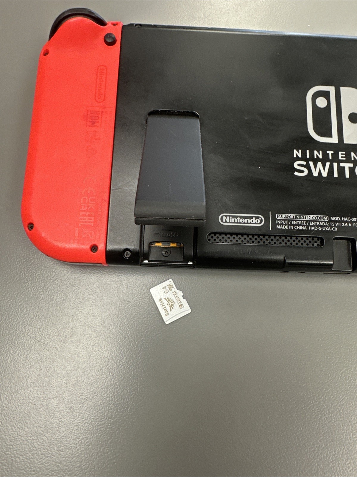 Nintendo Switch, Red/blue Joycons Please Read See photos USED with 64GB SD CARD