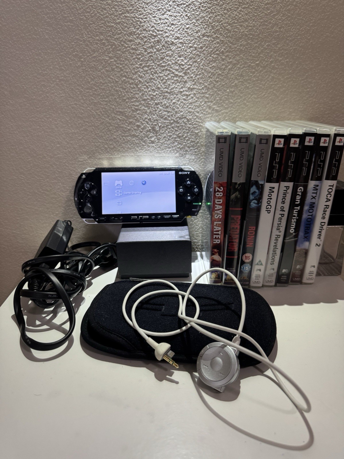 MINT* PSP 1000 w/ 5 games, 3 movies