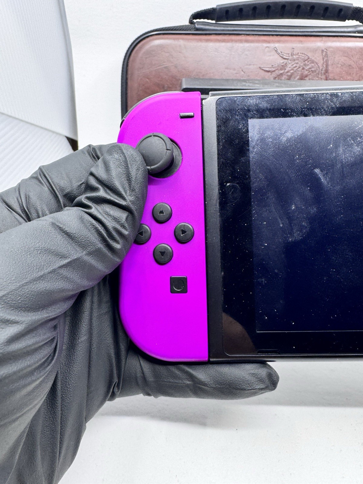 Nintendo Switch 32GB Console with Orange and Purple Joy-Con [w/ Dock & Case]