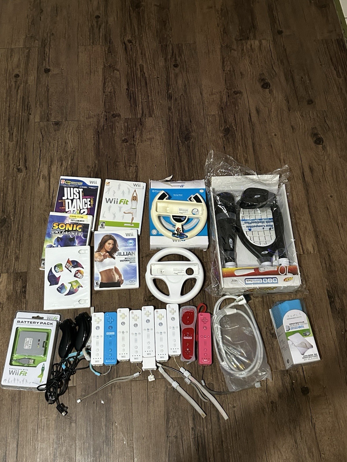 Huge Nintendo Wii Accessory Bundle,Remotes, MotionPlus,Wheels, Sports Pack,Games