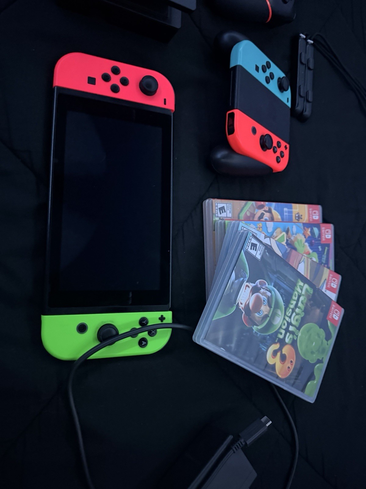 Nintendo Switch Console Neon Red & Green Joy-Con, Pro Controller, Case, 4 Games