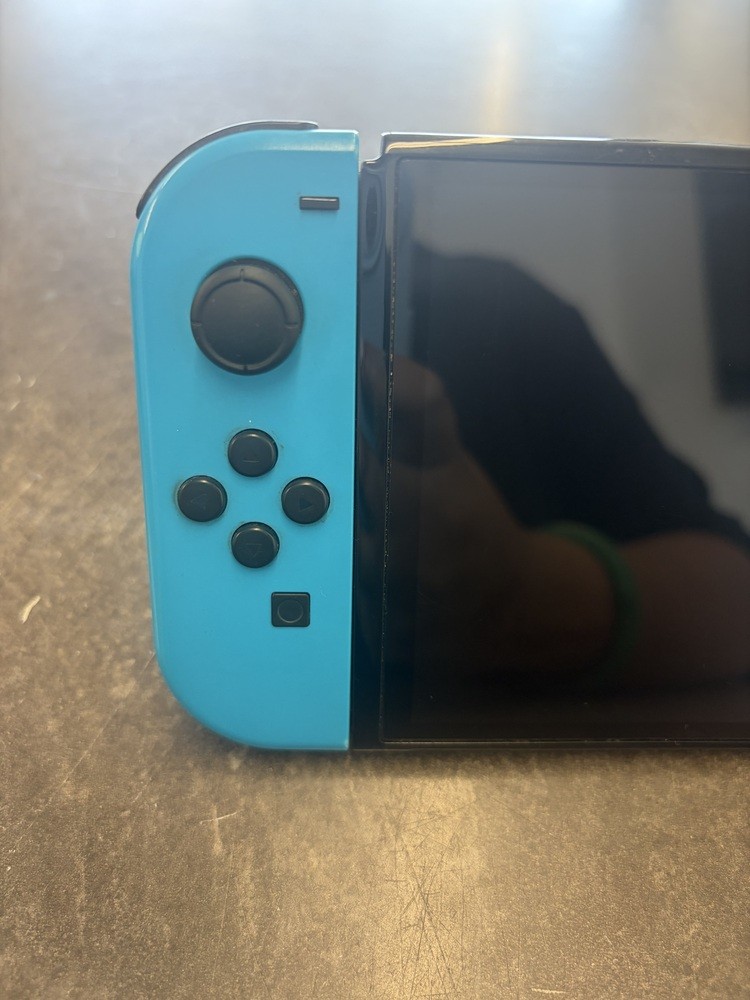 NINTENDO SWITCH OLED MODEL W/ NEON BLUE & NEON ORANGE JOY CONS