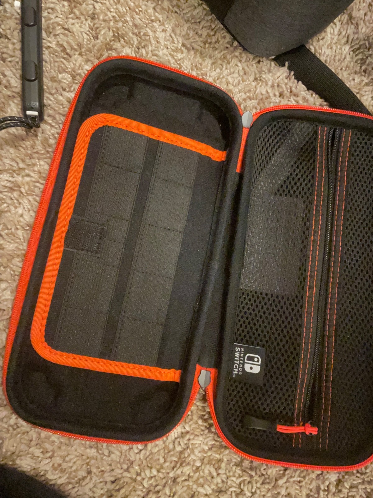 Nintendo Switch OLED console and regular Nintendo switch with accessories&games