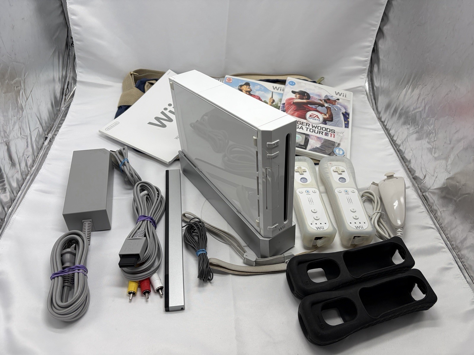 Nintendo Wii Console Bundle – 2 Controllers, Nunchuck, Power/AV Cords + 2 Games
