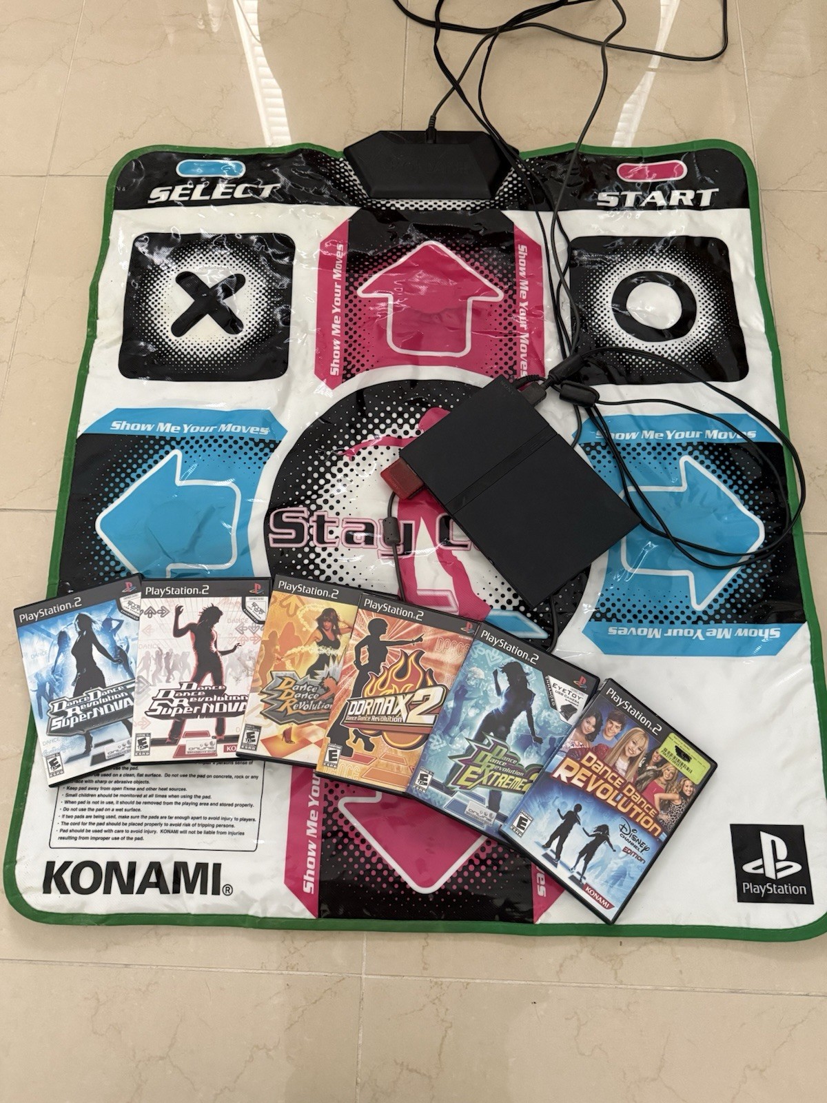 Sony PlayStation 2 and ddr pad + 6 games