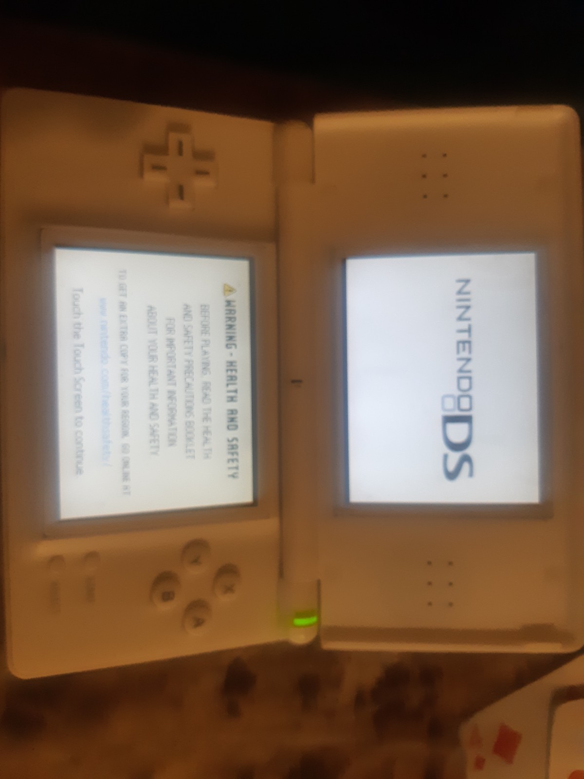 Nintendo DSi Handheld Game Console – White