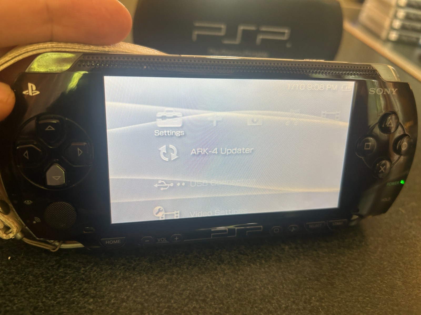 Sony PlayStation Portable console PSP-1004 with 8 games & 3 memory sticks