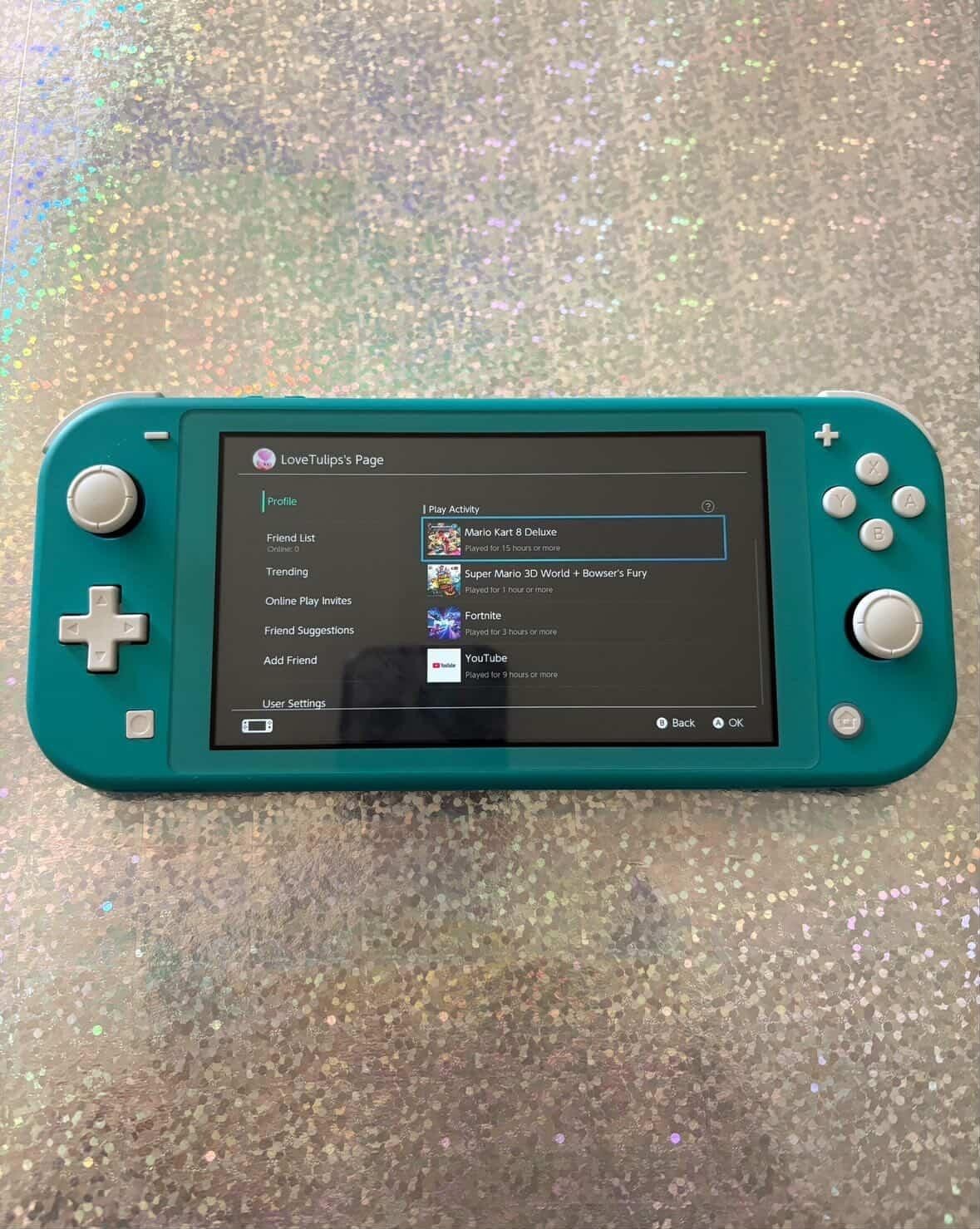 Nintendo Switch Lite Bundle with 3 Mario Games, Turquoise