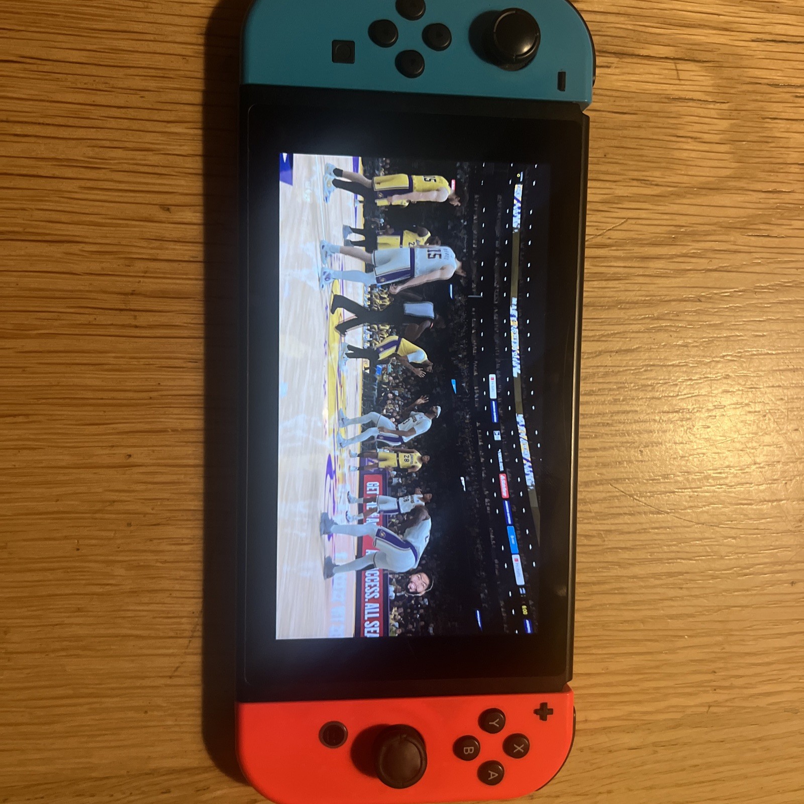 Nintendo Switch 32GB Handheld Console – Neon Red/Neon Blue