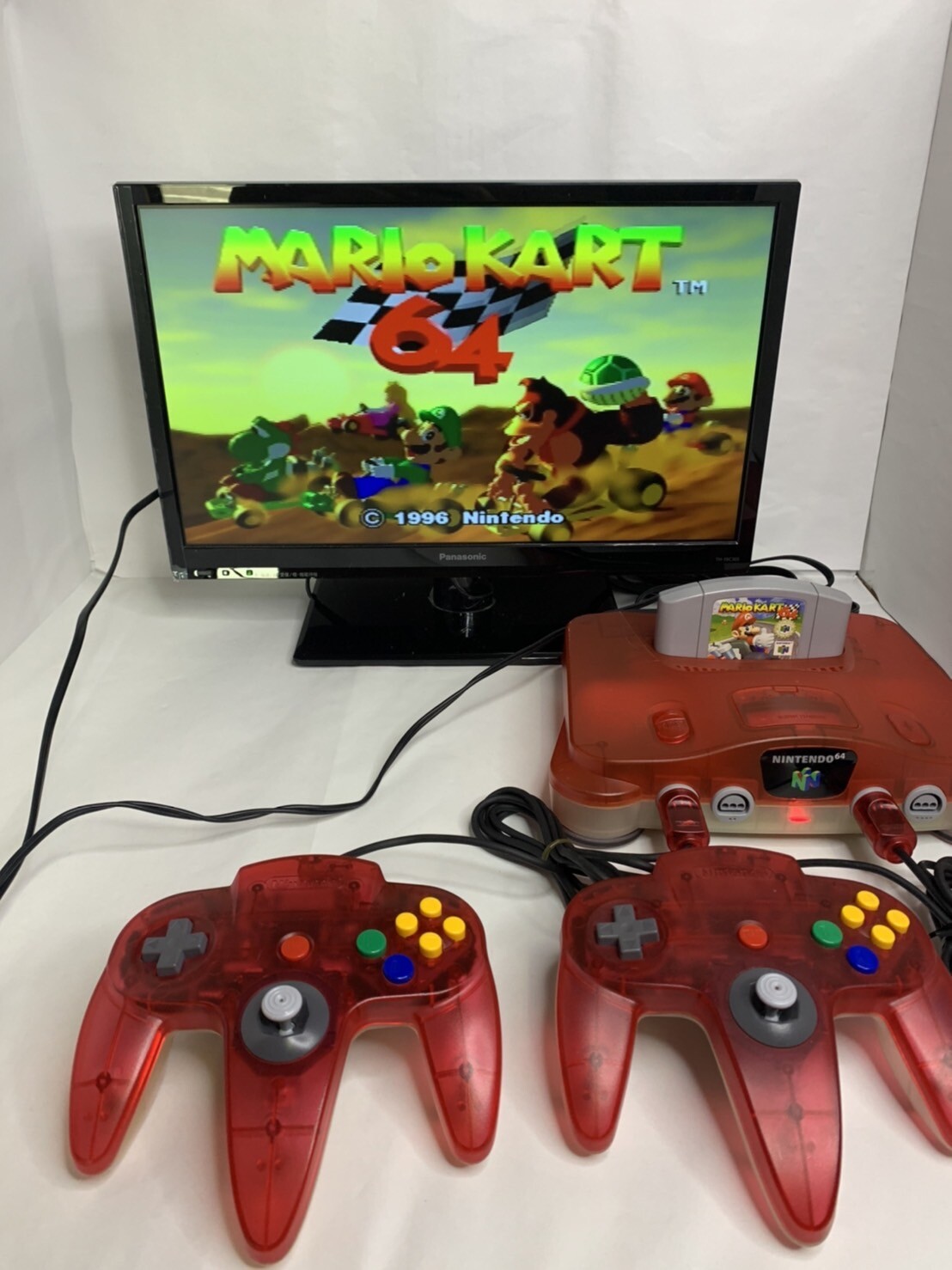Nintendo 64 N64 Console Clear Red 2 Set Controller Region Free Tested / Working