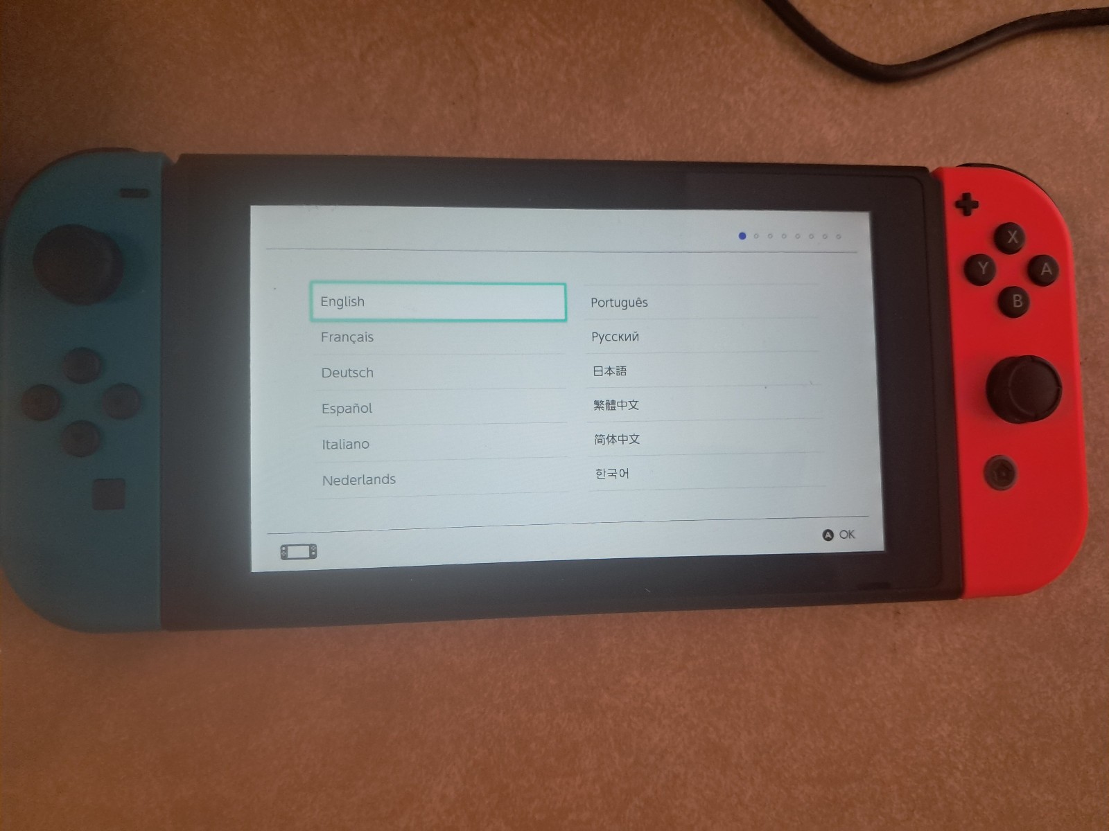 Nintendo Switch 32GB Handheld Console Red/Blue (hac 001-01) with pro controller