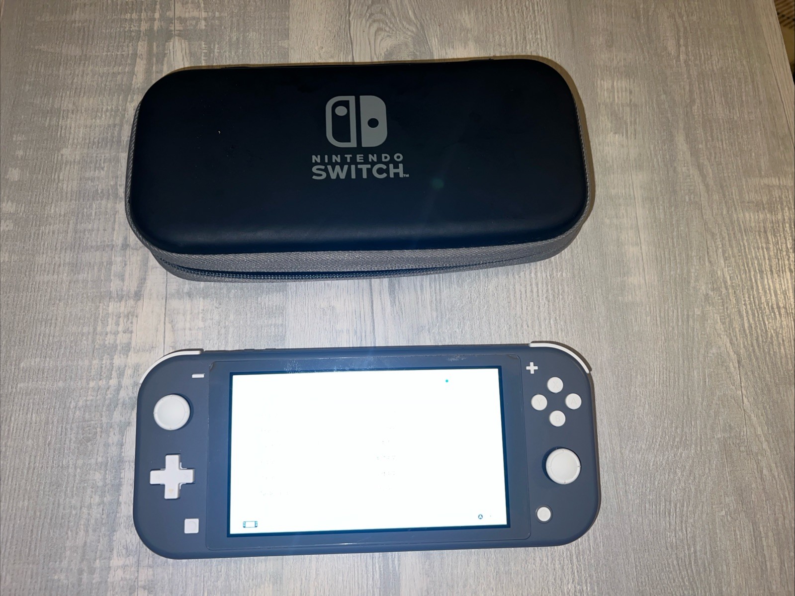 Nintendo Switch Lite Gray Handheld With Carry Case