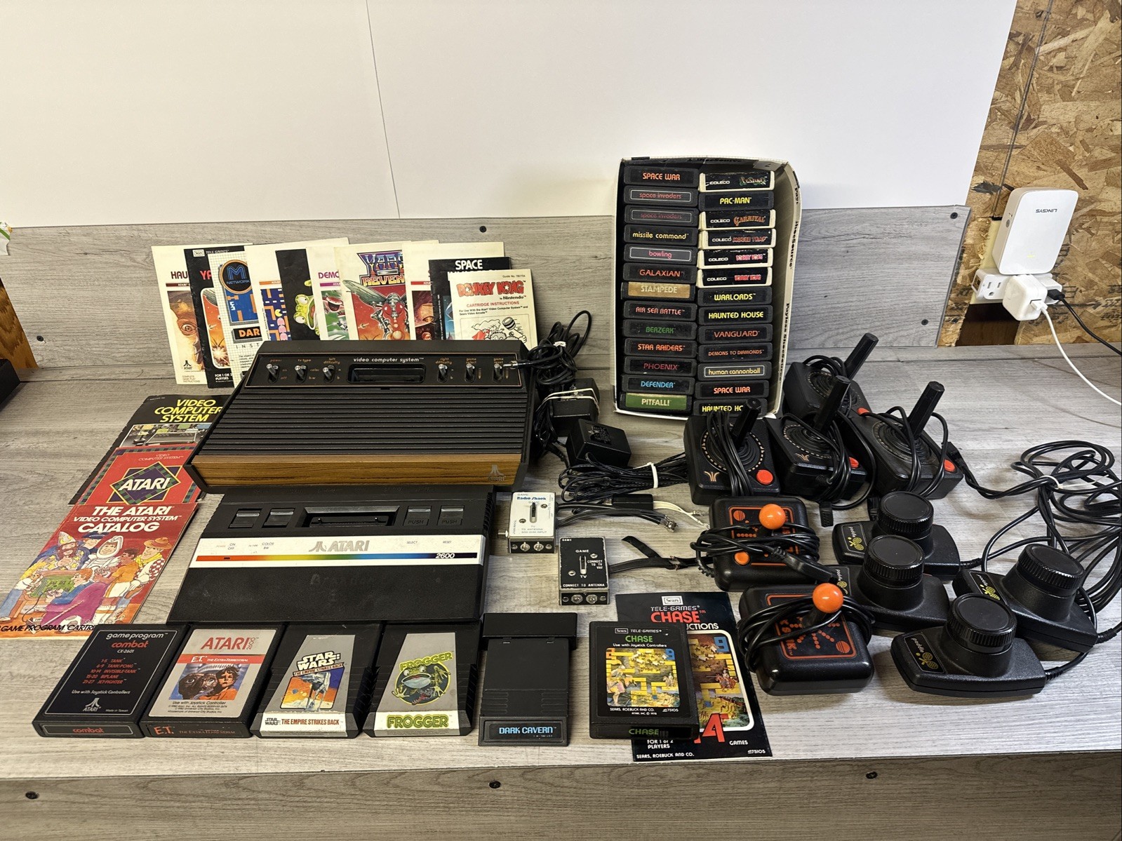 Atari 2600 System Bundle with Console, 32 Games, Joystick, Paddles, and More LOT