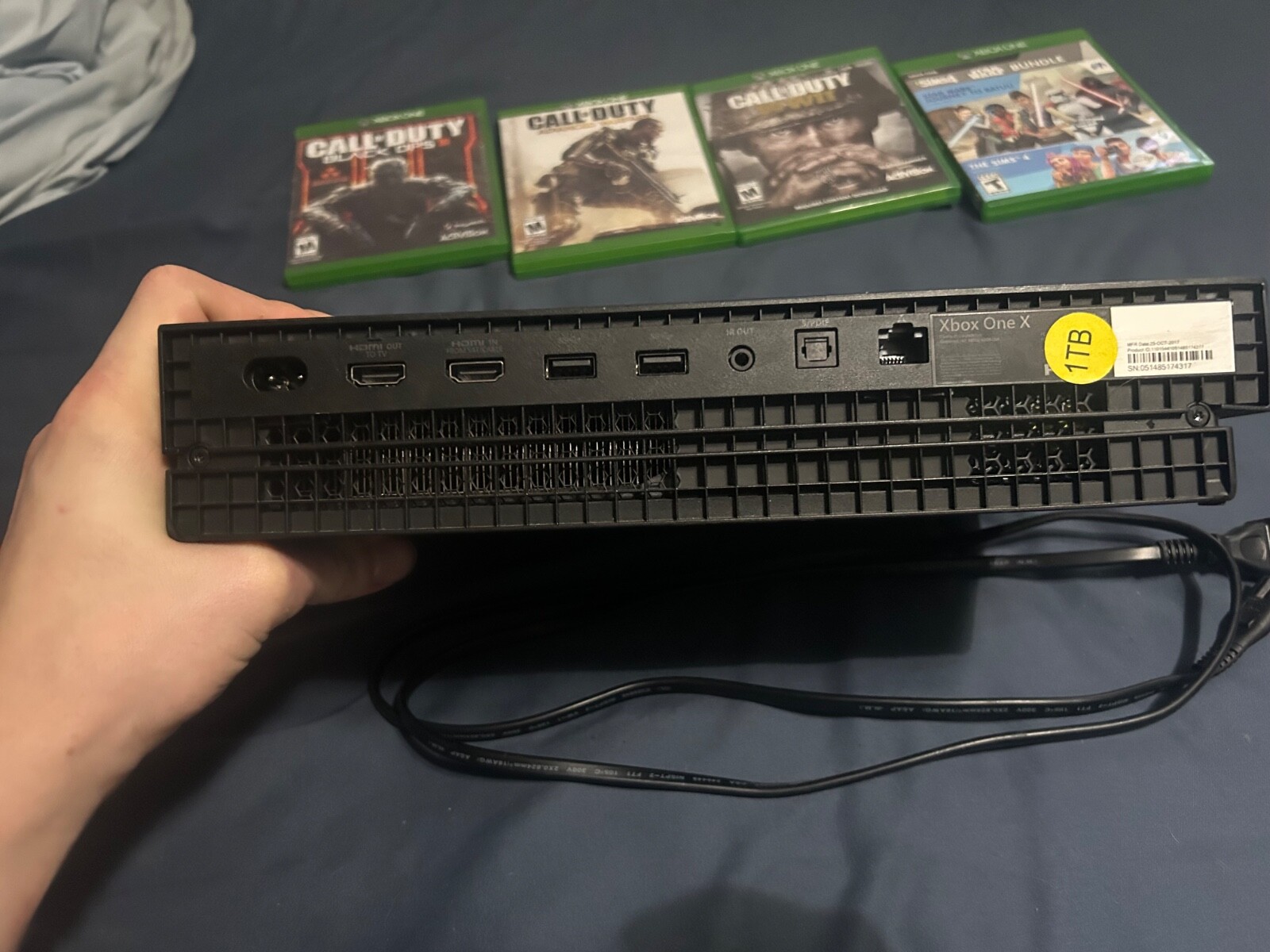 Microsoft Xbox One X 1TB Home Console – Black with 4 games