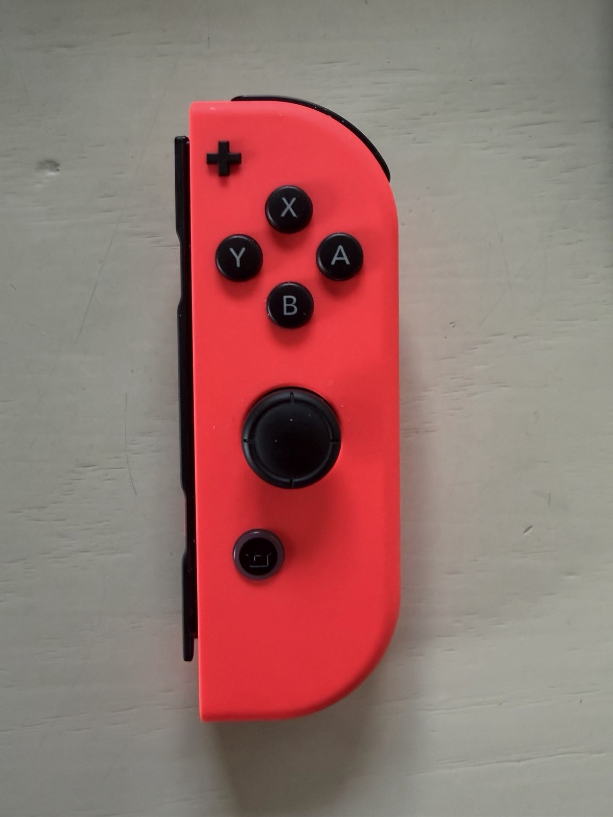 Nintendo Switch version 2, opened box, HAC-001(-01) handheld console, red/blue.
