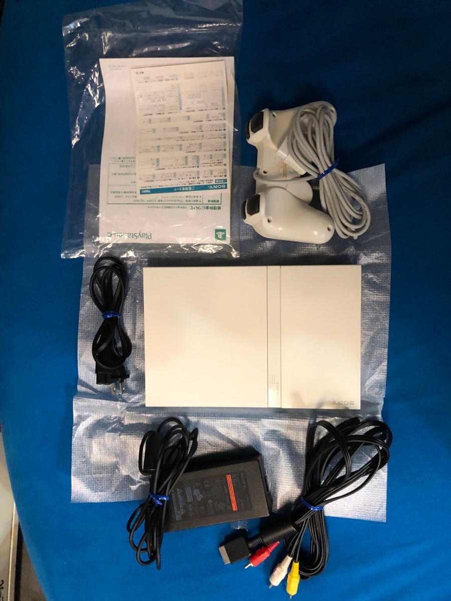 Excellent condition, manual unopened, working condition, PS2 SCPH-75000 white,