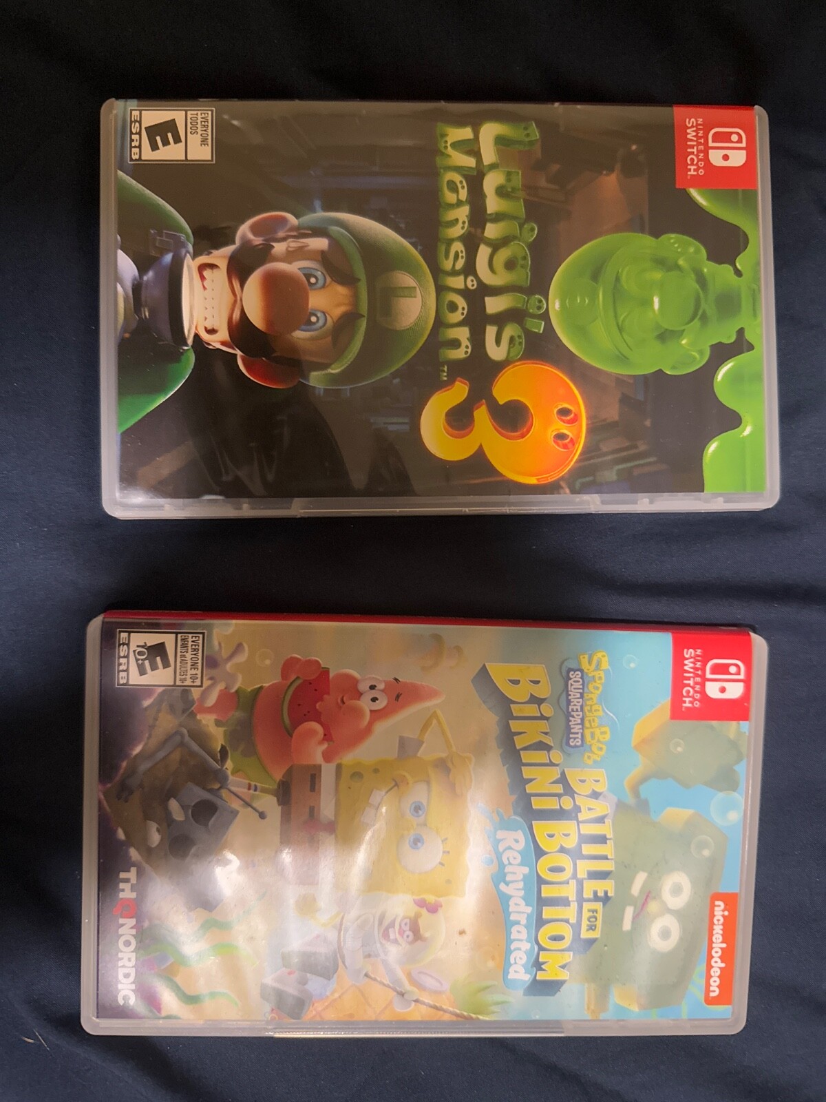 Nintendo Switch V2 Gray Joy Cons 32GB Gaming Console + Luigi’s Mansion 3 + SSBFB