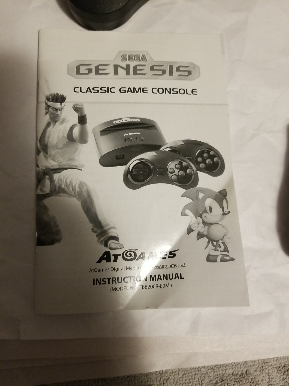 At Games Sega Genesis Classic Console With 2 controller and 40 games Built in.