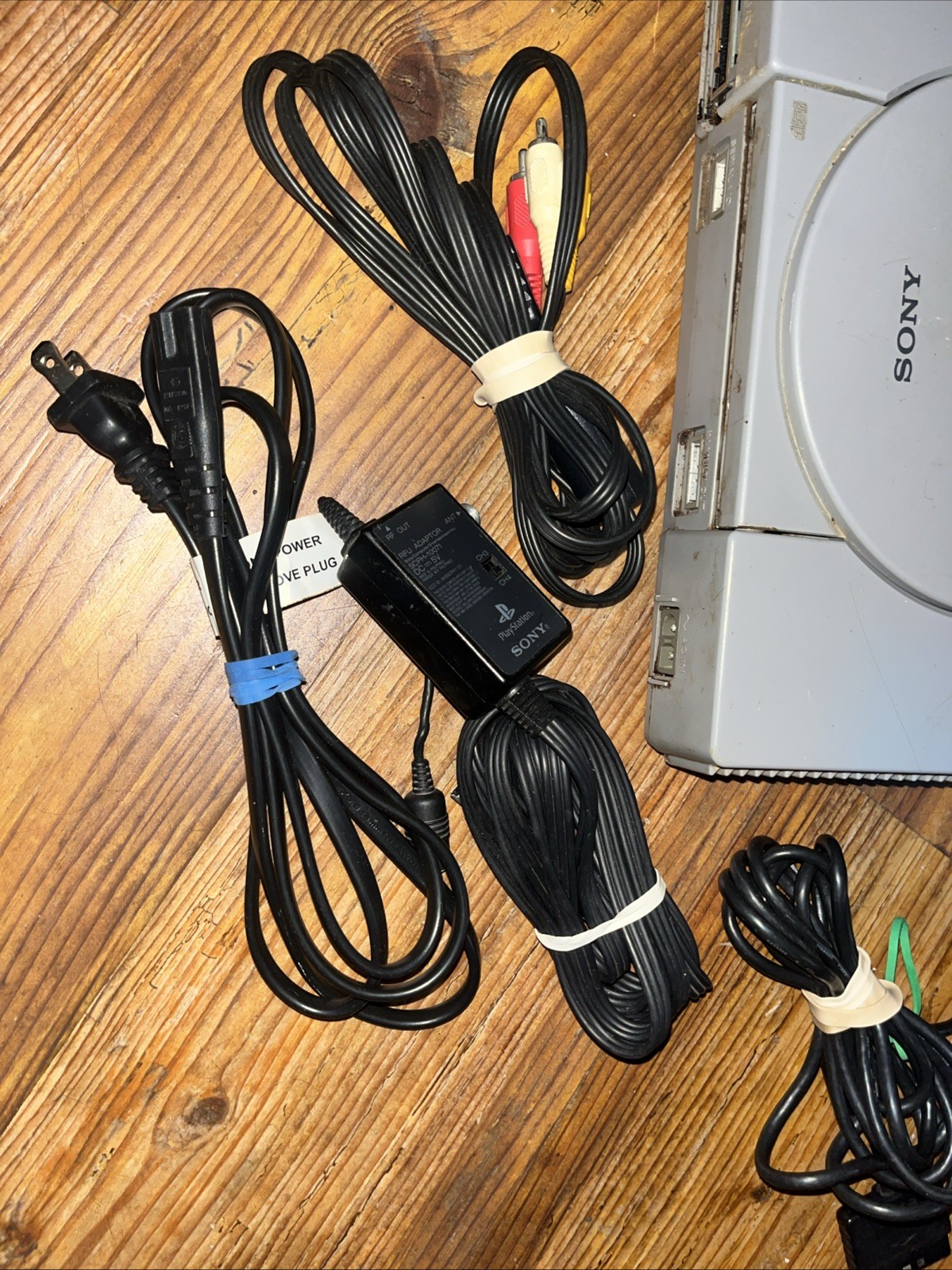 Sony Playstation 1 Gray Console With Games Controllers, A/V Cable, and Power