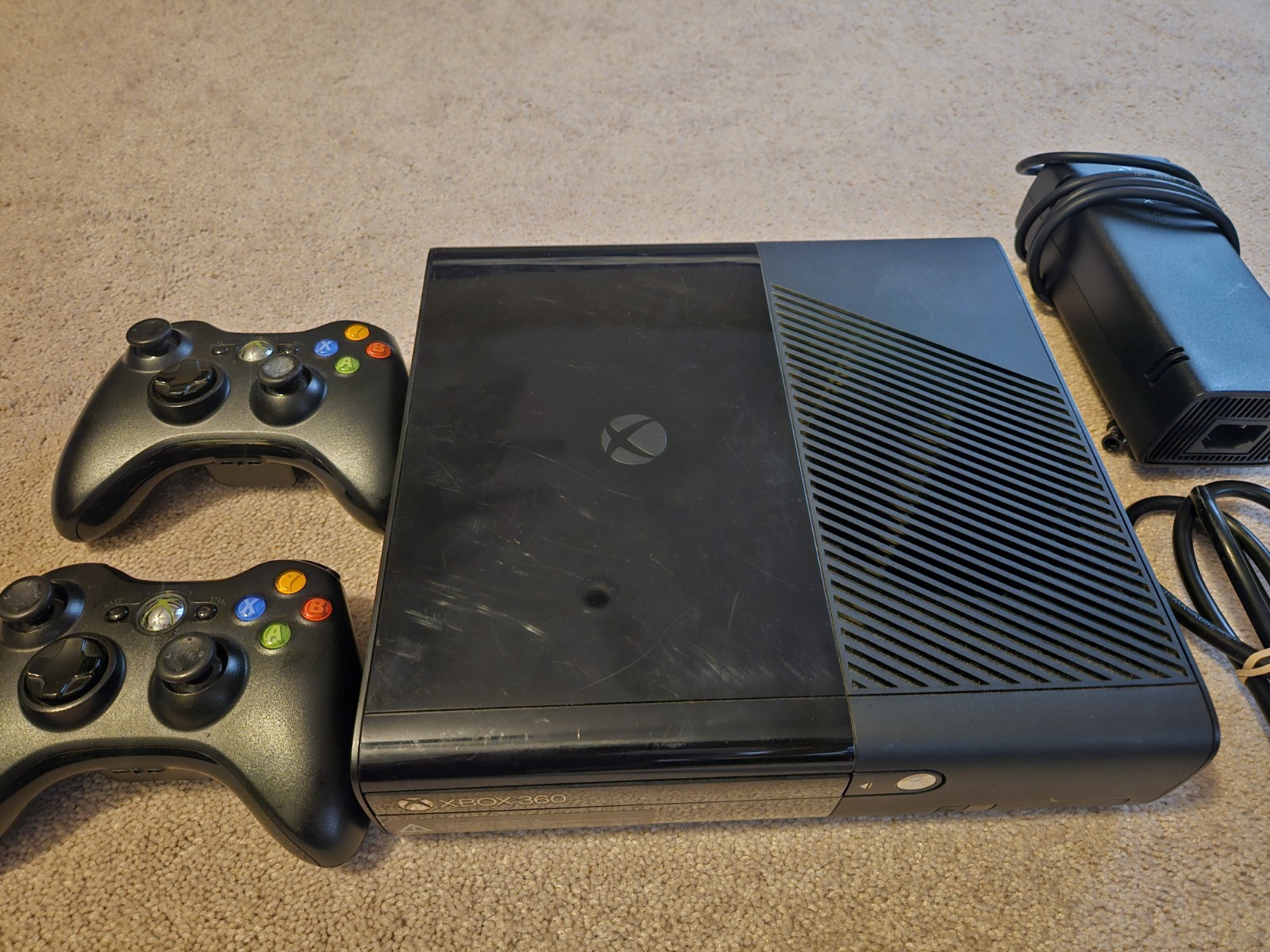 Microsoft Xbox 360 E 4GB Game Console – Black w/ 2 OEM Controller Bundle