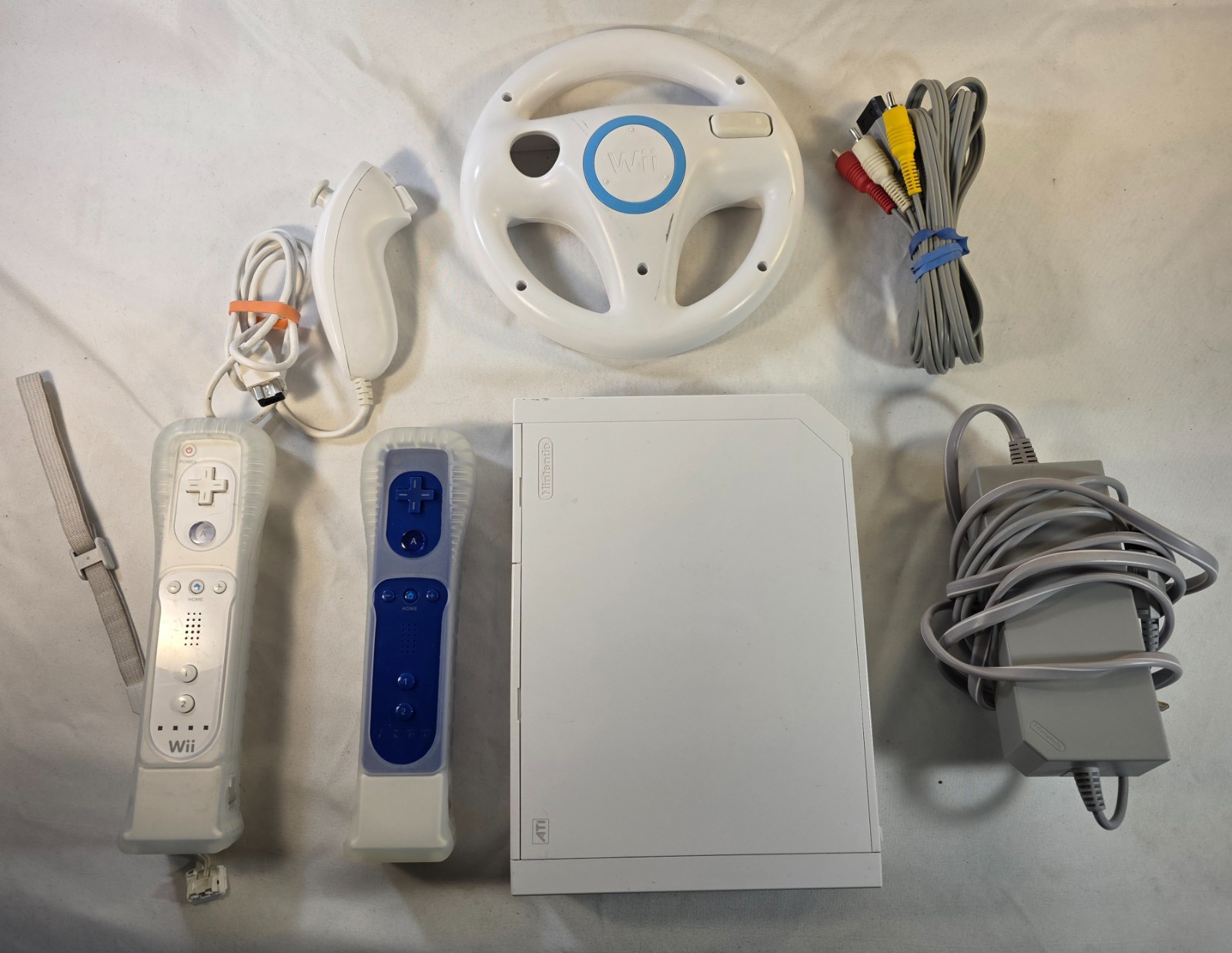 Nintendo Wii Console Bundle 2 Remotes Nunchuck Steering Wheel Cords