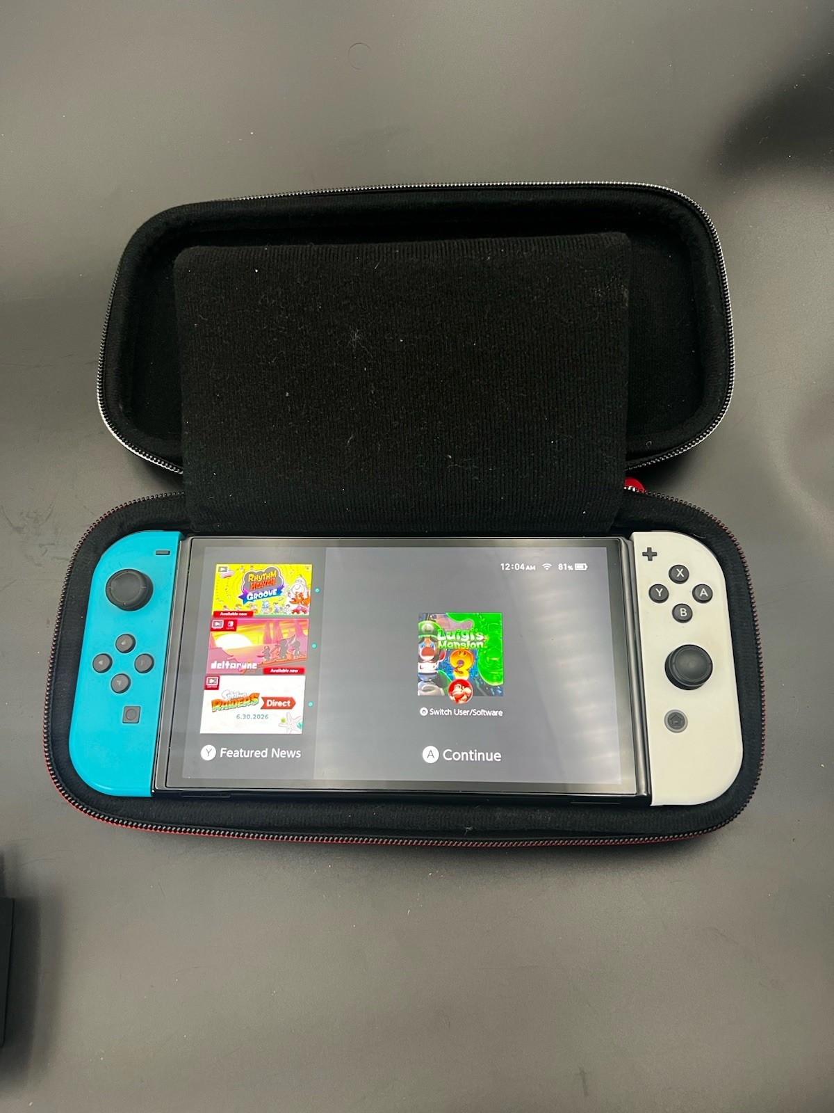 Nintendo Switch OLED 64GB Bundle White Dock Joy-Cons Luigi’s Mansion 3 Tested