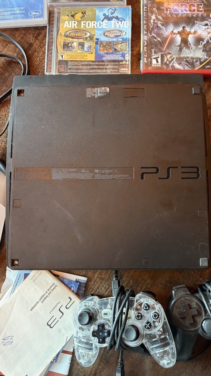 Sony PS3 Slim 320GB CECH-3001B Bundle 5 Games Two Controllers