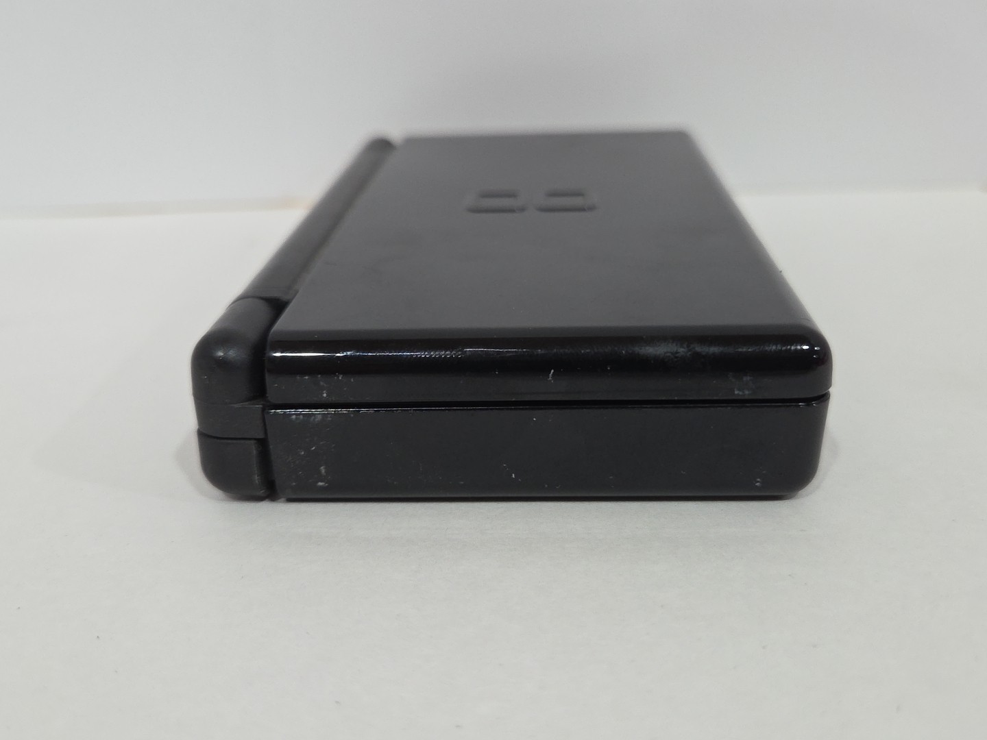 Nintendo DS Lite Console (Black) + 4 Games + Purple Case
