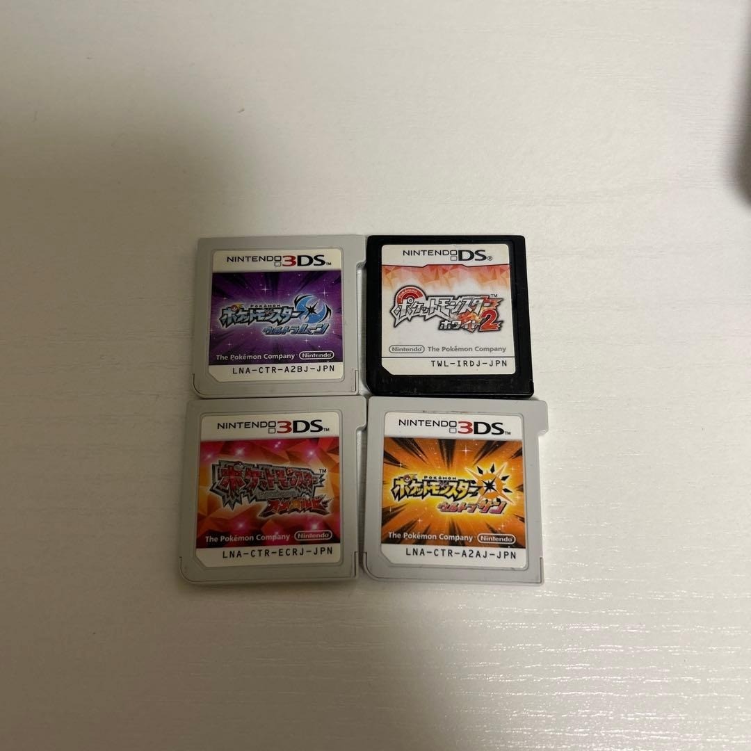 Nintendo 3DS White w/ Charger Box + 4 Pokemon Games Ultra Sun Moon Ruby 3762AK