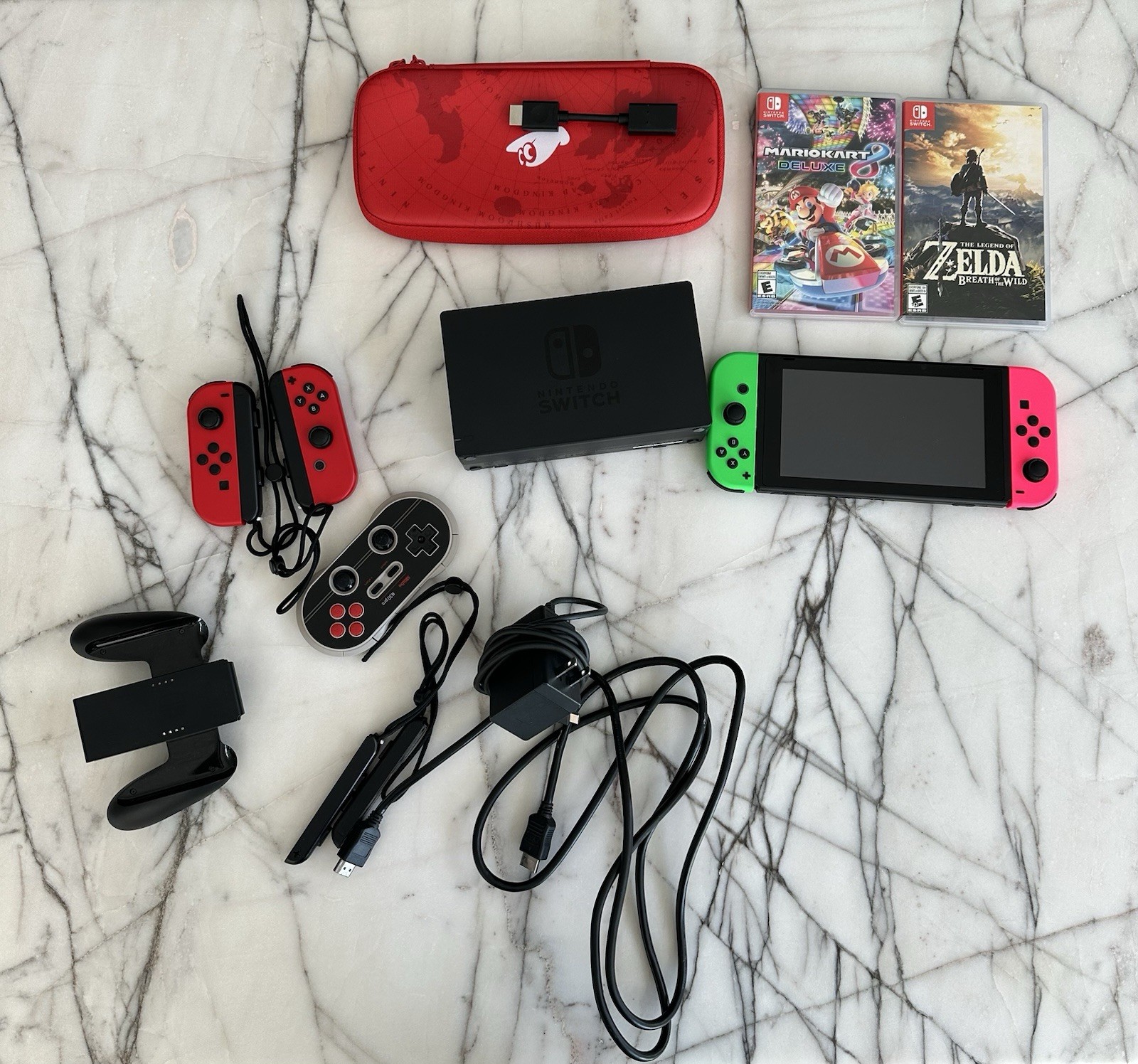 Nintendo Switch Super Mario Odyssey Edition (with Red Joy-Cons) & Games